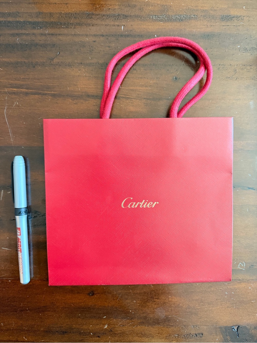Cartier red shopping bag